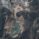 The site on Nov. 25, 2013. Note the water, where a mountain of construction waste would soon be built.